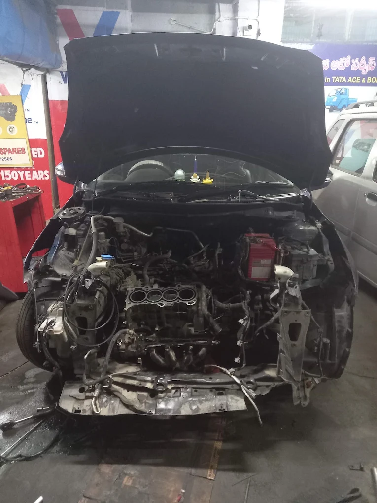 Car with front section opened for major repair